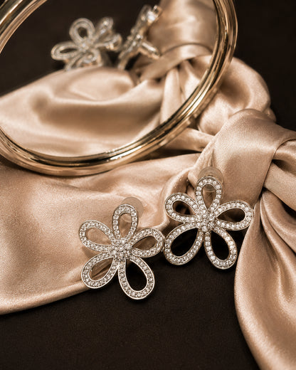 Rhinestone studded flower earrings