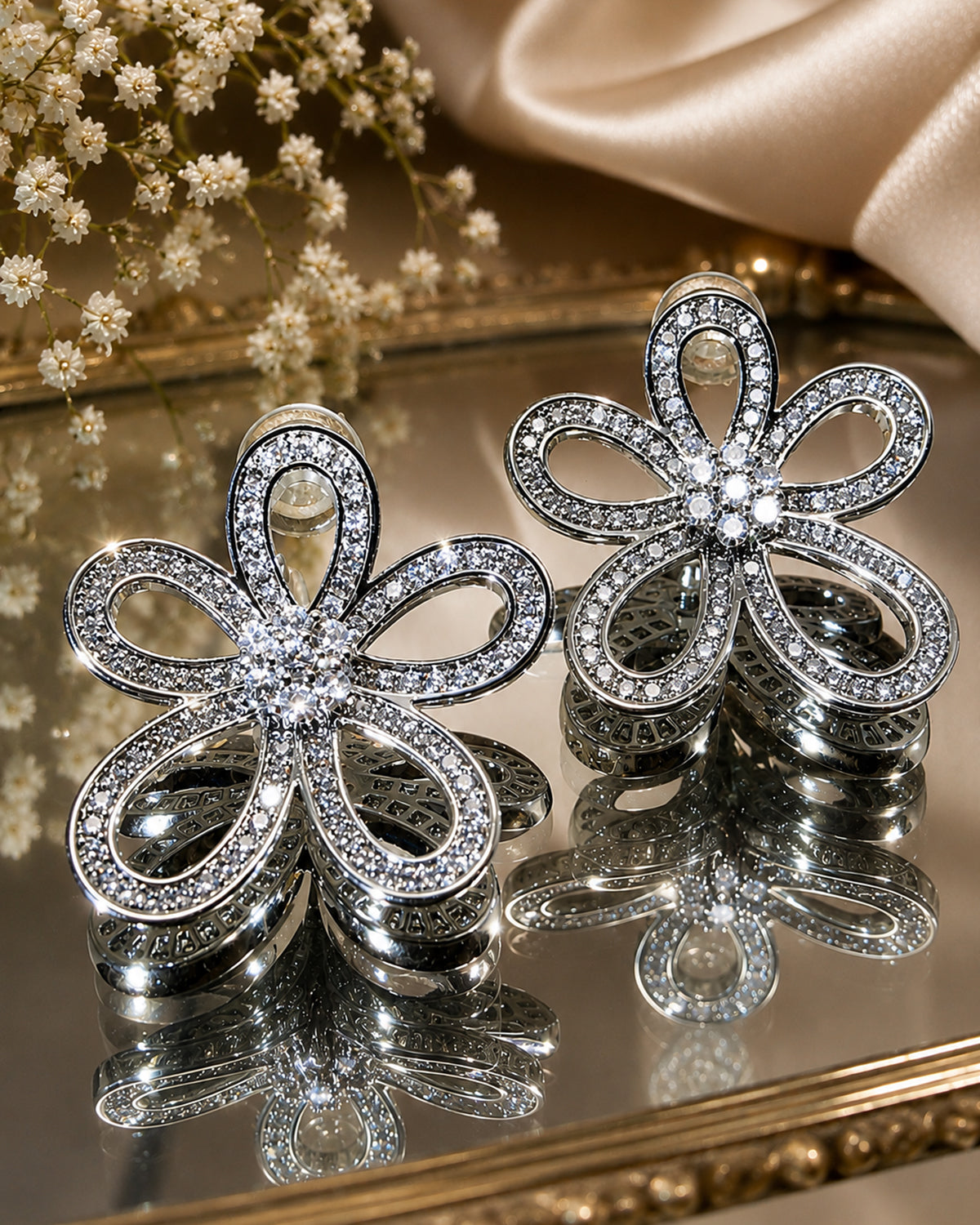 Rhinestone studded flower earrings